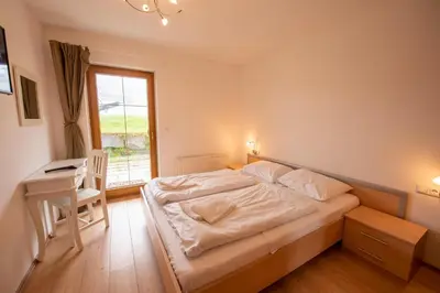 Ein Bett oder Betten in einem Zimmer der Unterkunft Almhäuser Filzsteinalpe Almhaus 198