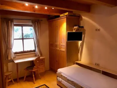 Ein Bett oder Betten in einem Zimmer der Unterkunft Haus 128 Top 2