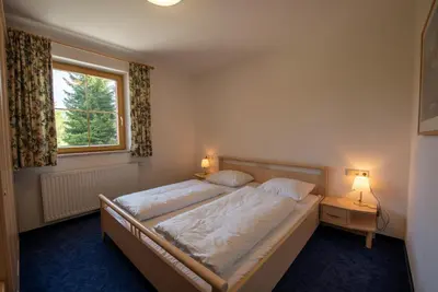 Ein Bett oder Betten in einem Zimmer der Unterkunft Haus Filzstein 135 Top 1