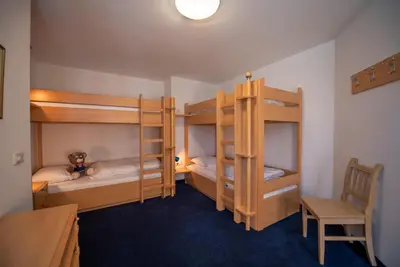 Ein Bett oder Betten in einem Zimmer der Unterkunft Haus Filzstein 135 Top 1
