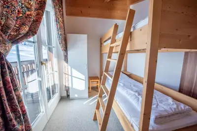 Ein Bett oder Betten in einem Zimmer der Unterkunft Haus 131 Top 3