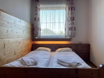 Ein Bett oder Betten in einem Zimmer der Unterkunft Haus Hölzlbauer Top 4