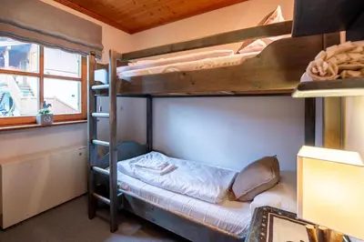 Ein Bett oder Betten in einem Zimmer der Unterkunft Haus 116 Top 2
