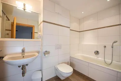 Ein Badezimmer in der Unterkunft Duxeranger D Top 1