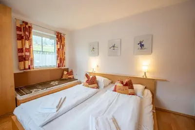 Ein Bett oder Betten in einem Zimmer der Unterkunft Haus 130 Top 2