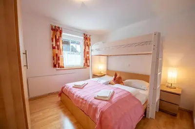 Ein Bett oder Betten in einem Zimmer der Unterkunft Haus 130 Top 2