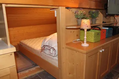 Ein Bett oder Betten in einem Zimmer der Unterkunft Chalet Alpine Royal A Top 13