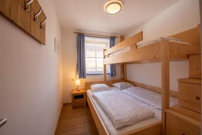 Ein Bett oder Betten in einem Zimmer der Unterkunft Duxeranger E Top 5