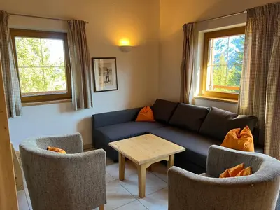Ein Sitzbereich in der Unterkunft Almhäuser Filzsteinalpe Almhaus 202
