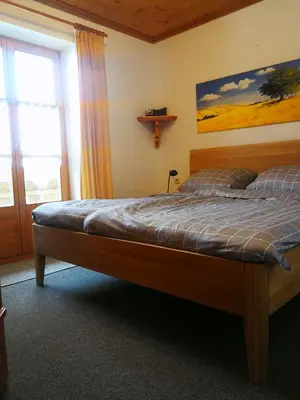 Ein Bett oder Betten in einem Zimmer der Unterkunft Haus 116 Top 3
