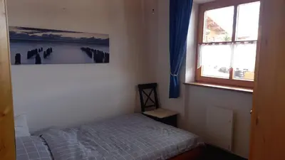 Ein Bett oder Betten in einem Zimmer der Unterkunft Haus 116 Top 3