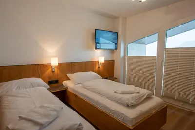 Ein Bett oder Betten in einem Zimmer der Unterkunft Arena Juwel 104 Top 9
