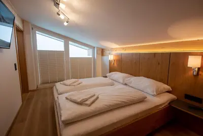 Ein Bett oder Betten in einem Zimmer der Unterkunft Arena Juwel 104 Top 9