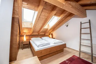 Ein Bett oder Betten in einem Zimmer der Unterkunft Almhäuser Filzsteinalpe Almhaus 196