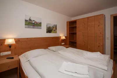 Ein Bett oder Betten in einem Zimmer der Unterkunft Almhäuser Filzsteinalpe Almhaus 196