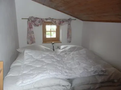 Ein Bett oder Betten in einem Zimmer der Unterkunft Haus Winterland Top 5