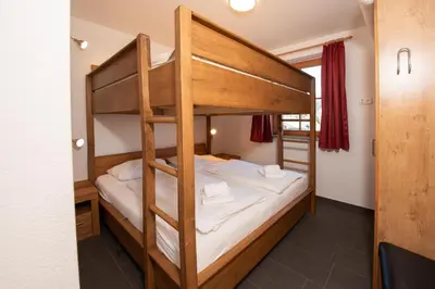 Ein Bett oder Betten in einem Zimmer der Unterkunft Duxeranger E Top 3