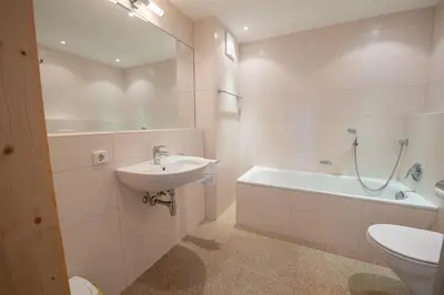 Ein Badezimmer in der Unterkunft Duxeranger E Top 7