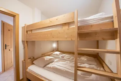 Ein Bett oder Betten in einem Zimmer der Unterkunft Haus Filzstein 136 Top 7
