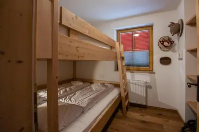 Ein Bett oder Betten in einem Zimmer der Unterkunft Haus Filzstein 136 Top 7