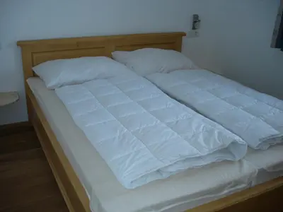 Ein Bett oder Betten in einem Zimmer der Unterkunft Duxeranger D Top 6