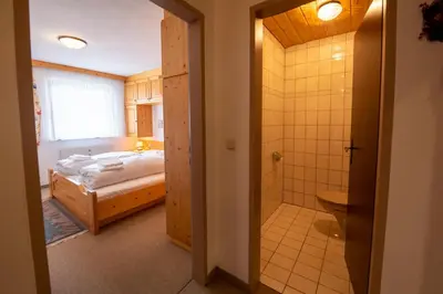 Ein Bett oder Betten in einem Zimmer der Unterkunft Chalet Alpine Royal A Top 2