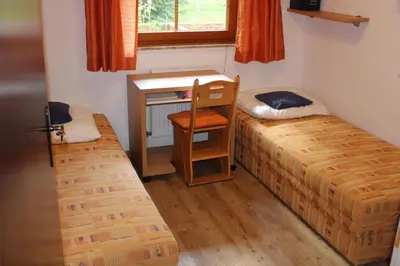 Ein Bett oder Betten in einem Zimmer der Unterkunft Chalet Alpine Royal B Top 19