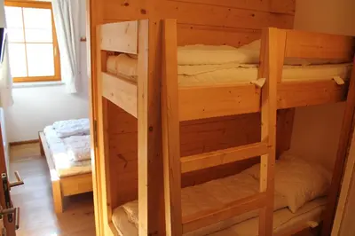 Ein Bett oder Betten in einem Zimmer der Unterkunft Duxeranger C Top 3