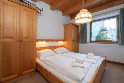 Ein Bett oder Betten in einem Zimmer der Unterkunft Haus 76 Top 1