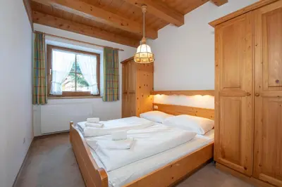 Ein Bett oder Betten in einem Zimmer der Unterkunft Haus 76 Top 1