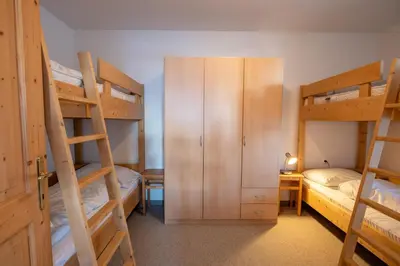 Ein Bett oder Betten in einem Zimmer der Unterkunft Haus 130 Top 1
