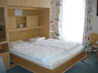 Ein Bett oder Betten in einem Zimmer der Unterkunft Chalet Alpine Royal B Top 21