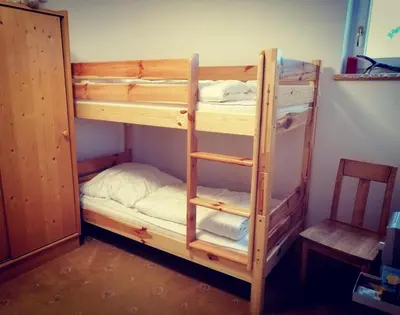 Ein Bett oder Betten in einem Zimmer der Unterkunft Haus 129 Top 1