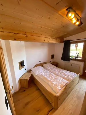 Ein Bett oder Betten in einem Zimmer der Unterkunft Chalet Alpine Royal A Top14