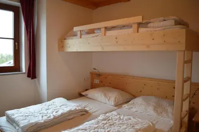 Ein Bett oder Betten in einem Zimmer der Unterkunft Duxeranger B Top 6