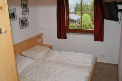 Ein Bett oder Betten in einem Zimmer der Unterkunft Duxeranger B Top 6