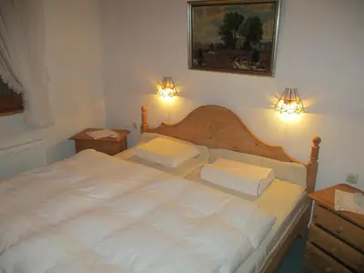 Ein Bett oder Betten in einem Zimmer der Unterkunft Haus 33 Top 1