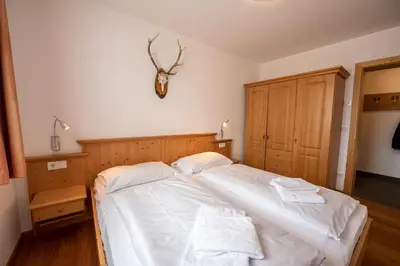 Ein Bett oder Betten in einem Zimmer der Unterkunft Duxeranger B Top 1