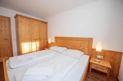 Ein Bett oder Betten in einem Zimmer der Unterkunft Duxeranger B Top 4
