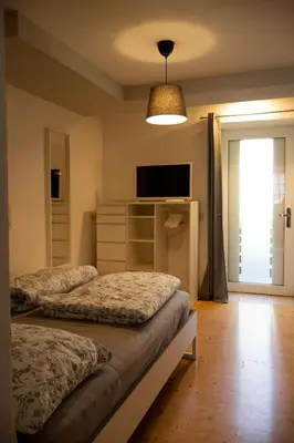 Ein Bett oder Betten in einem Zimmer der Unterkunft Haus Irina Zimmer
