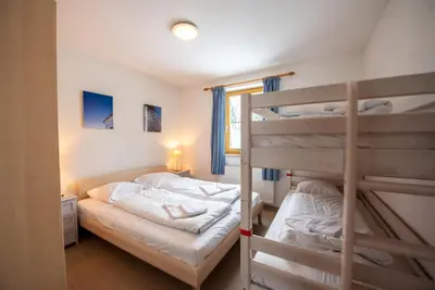 Ein Bett oder Betten in einem Zimmer der Unterkunft Haus Filzstein 138 Top 12