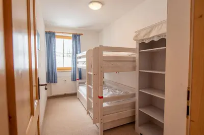 Ein Bett oder Betten in einem Zimmer der Unterkunft Haus Filzstein 138 Top 12