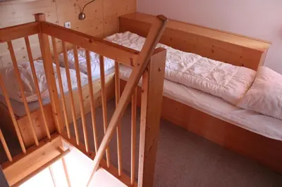 Ein Bett oder Betten in einem Zimmer der Unterkunft Haus 150 Top 1