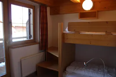 Ein Bett oder Betten in einem Zimmer der Unterkunft Haus 150 Top 1