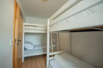 Ein Bett oder Betten in einem Zimmer der Unterkunft Almhäuser Filzsteinalpe Almhaus 197