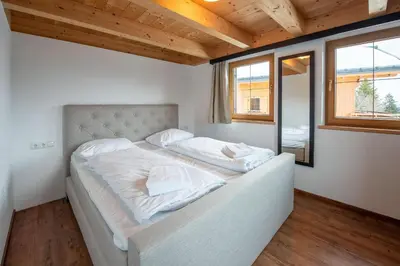 Ein Bett oder Betten in einem Zimmer der Unterkunft Almhäuser Filzsteinalpe Almhaus 204