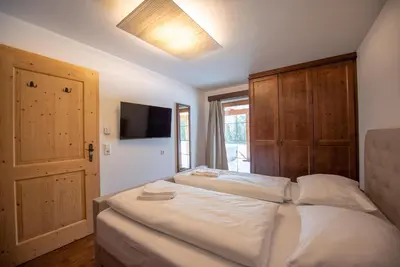 Ein Bett oder Betten in einem Zimmer der Unterkunft Almhäuser Filzsteinalpe Almhaus 204