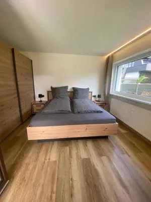 Ein Bett oder Betten in einem Zimmer der Unterkunft Kitz Kaiser Appartement