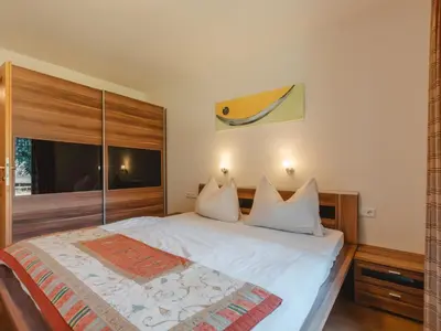 Ein Bett oder Betten in einem Zimmer der Unterkunft Holiday Home Hochkrimml by Interhome