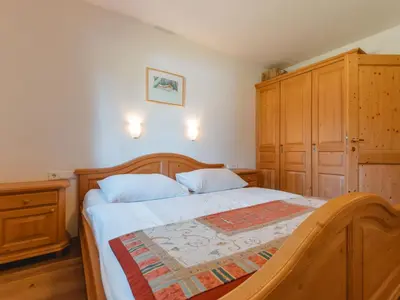 Ein Bett oder Betten in einem Zimmer der Unterkunft Holiday Home Hochkrimml by Interhome